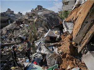 Gaza families struggle to recover from days of torrential rains that killed 12 people
